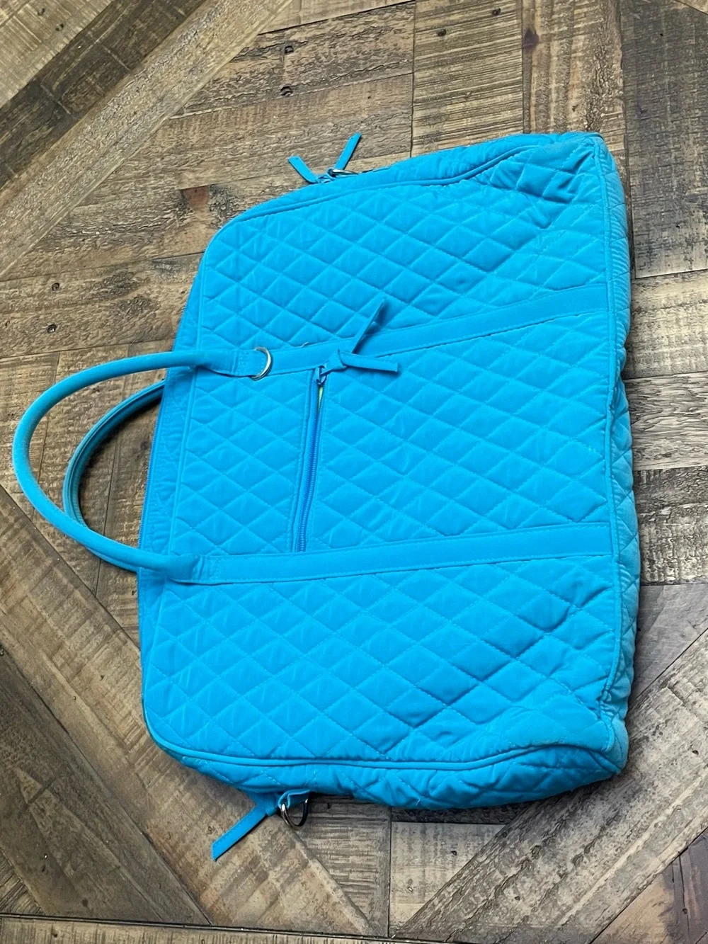 a Vera Bradley Microfiber Turquoise Large Laptop Bag.